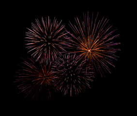 Red firework sparkling on black background for celebration and anniversary