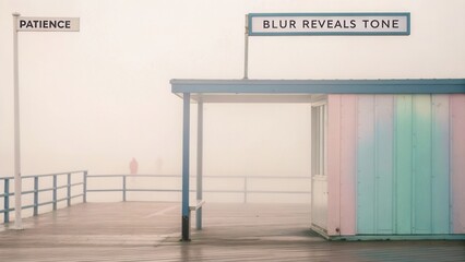 Serene Coastal Scene Featuring Colorful Beach Hut and Foggy Atmosphere with Inspirational Textual Elements