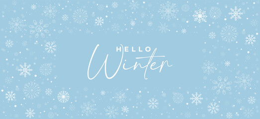 Winter banner with delicate white snowflakes and bokeh effect on a pastel blue background. Light textured background. Calm seasonal banner with handwritten typography