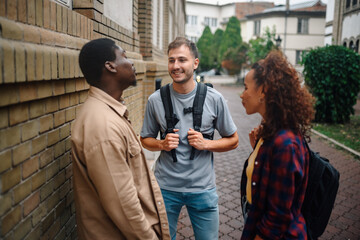 Students meeting and talking on university campus