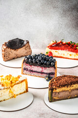 Assorted cheesecake slices with mixed flavors
