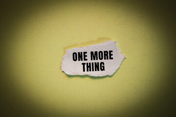 One More Thing message written on ripped torn paper background. Conceptual One More Thing symbol. Copy space.