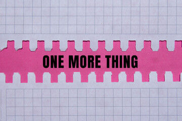 One More Thing message written on ripped torn paper background. Conceptual One More Thing symbol. Copy space.