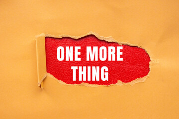 One More Thing message written on ripped torn paper background. Conceptual One More Thing symbol. Copy space.