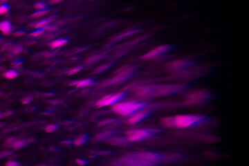 Colored light effects on dark background with grain and magic lights. Neon Glow Modern 90s, lo-fi Aesthetics. Design effect.