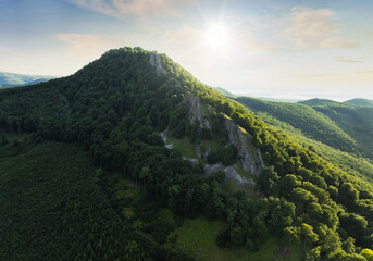 Forest nature landcape with peak and sun at dramatic sunset, Slovakia - Carpathian