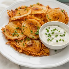 2 ingredient onion chips were served on a white plate in a clean close up food presentation