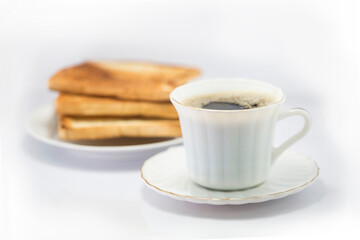 Breakfast with coffee and toast on white background
