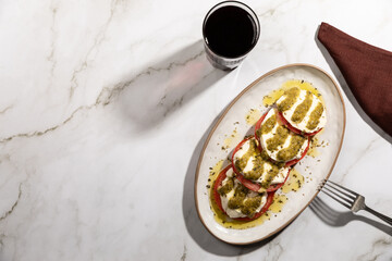 Caprese salad isolated on kitchen countertop surface with copy space