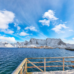 Remarkable view of Sakrisoy village and snowy mountaines on background