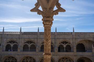 Intricate stone pillar in the Jer&oacute;nimos Monastery courtyard, Lisbon, Portugal
