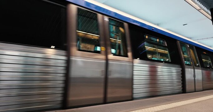 Empty metro train leaving from the first station on a subway line.