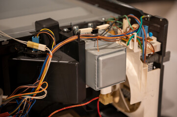 Mature Man Repairing Electronics