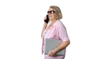 Senior woman talking on smartphone holding laptop