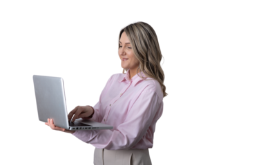 Businesswoman smiling while typing on laptop, remote working
