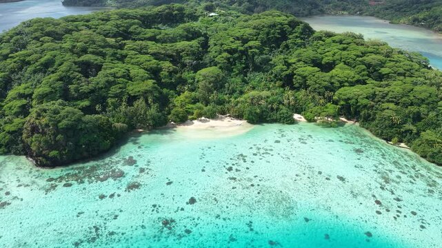 Huahine Island, French Polynesia. Aerial View of Hana Iti Beach and Stunning Landscape, White Sand, Bay and Green Rainforest on Hills