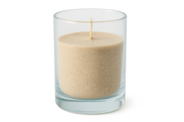 Unlit beige scented candle in clear glass holder with transparent background