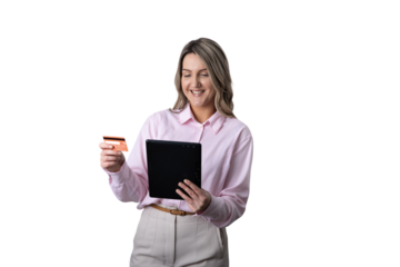 Woman making online payment holding credit card and tablet