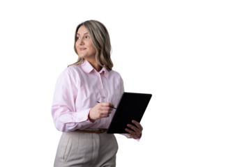 Businesswoman smiling while using digital tablet with stylus