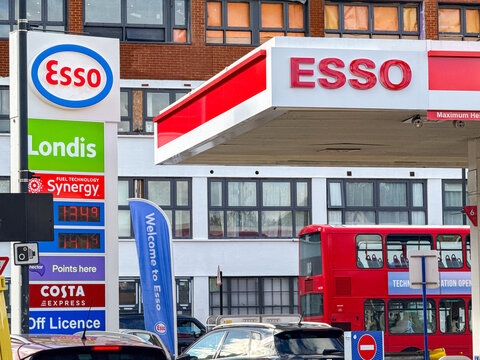 London, England, UK - 25 October 2025: Signs outside a petrol station selling Esso fuels in Wembley in north London