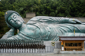 giant reclining buddha statue at nanzoin temple in japan