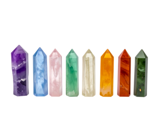 Eight multicolored crystal points stand upright against a dark backdrop, forming a vibrant and symmetrical display