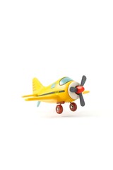 Yellow toy airplane against white background isolated commercial imagery