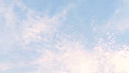 Bright summer sun shines in the beautiful blue sky with fluffy white clouds, a perfect clear day nature background