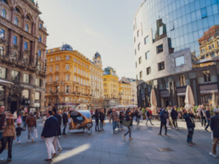 Fototapeta premium Crowd of anonymous people walking on busy city street 