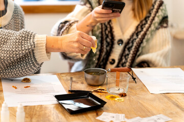 Women attending natural aromatic soy candle making workshop