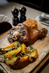 Classic Pork Shank Meal with Crispy Potatoes