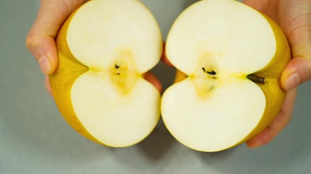  Cut a pear. Asian pears, nashi pear, organic fruit and vitamin nutrition