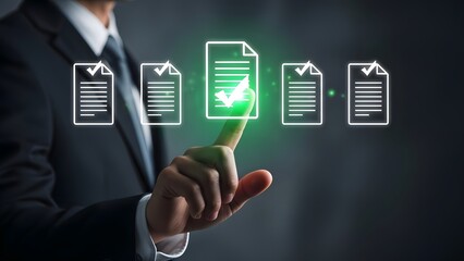 Businessman selecting approved document from digital display with glowing green checkmark