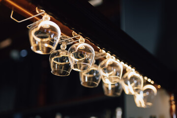 Hanging glasses on the bar