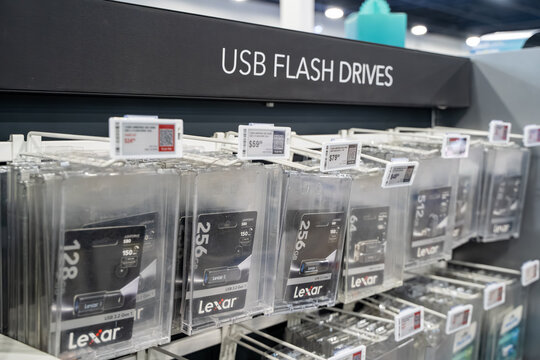 View of USB flash drives with Lexar products on retail shelf. Toronto, Canada - December 3, 2025.