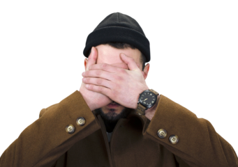 A man covering his eyes with his hands