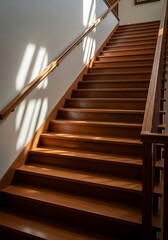 Stylish wooden staircase design with natural light in residential space
