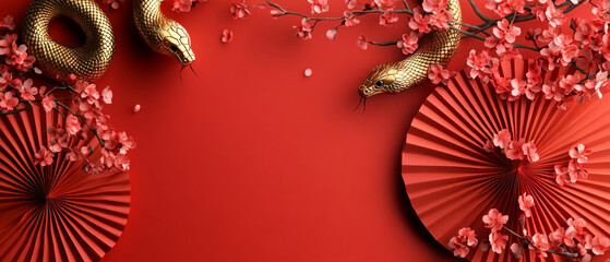 Bright fans, blossoming branches and golden snakes on red fabric create a festive oriental atmosphere, ideal for decorating cultural events.