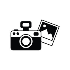 Iconic black and white camera with a photo of mountains