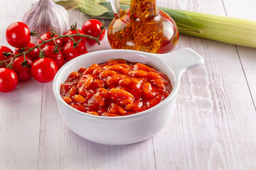 White canned bean in tomato sauce