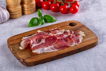 Cured pork Spanish jamon slices