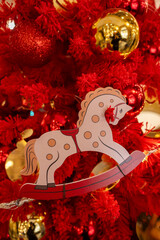 Red Christmas Tree with Rocking Horse Ornament