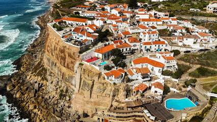 Stunning Aerial Photograph of Azenhas do Mar, Portugal &mdash; Dramatic Cliffs, Ocean Waves and Coastal Village with Relaxing Summer Holiday Atmosphere