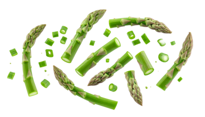 Fresh green chopped asparagus spears and pieces dynamically floating on a white background