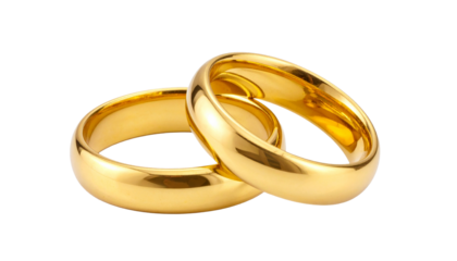 Two golden wedding rings interlocked, symbolizing love and commitment, isolated on white