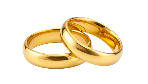 Two golden wedding rings interlocked, symbolizing love and commitment, isolated on white
