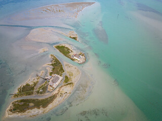 aerial view island in the natural park in the north of italy, lagoon, friuli venezia giulia, italy