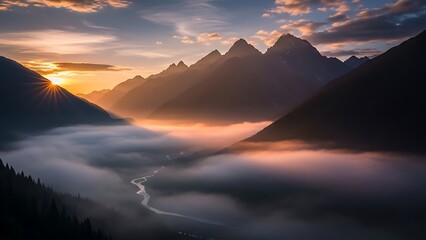 Majestic mountain range at sunset with fog filled valley and golden light