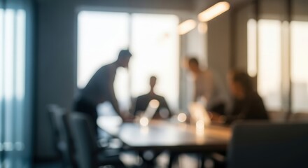 Fototapeta premium Blurred Abstract blurred view of colleagues collaborating in modern office meeting space