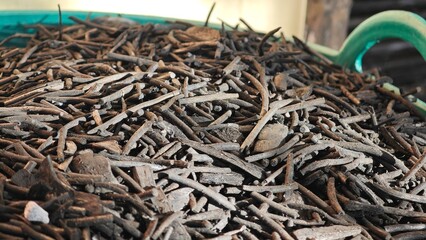 Pile of black charcoal sticks.